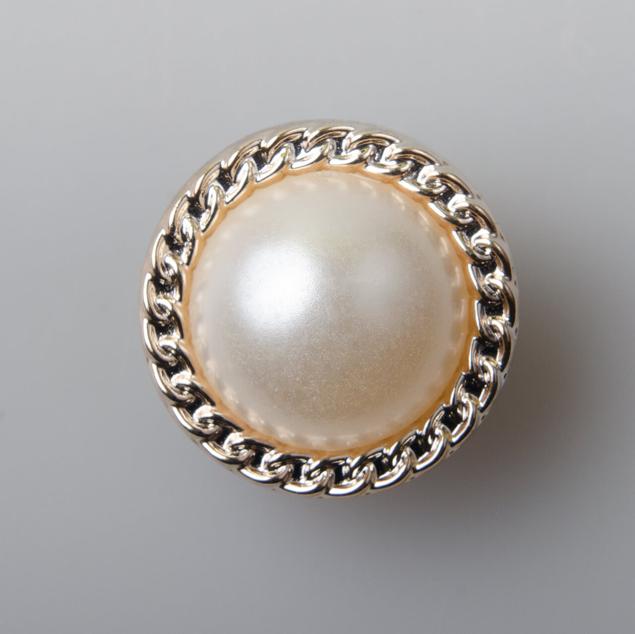 Guzik elegancki perłowy, tworzywo sztuczne, śr. 21 mm, kolor złoty (JD79)