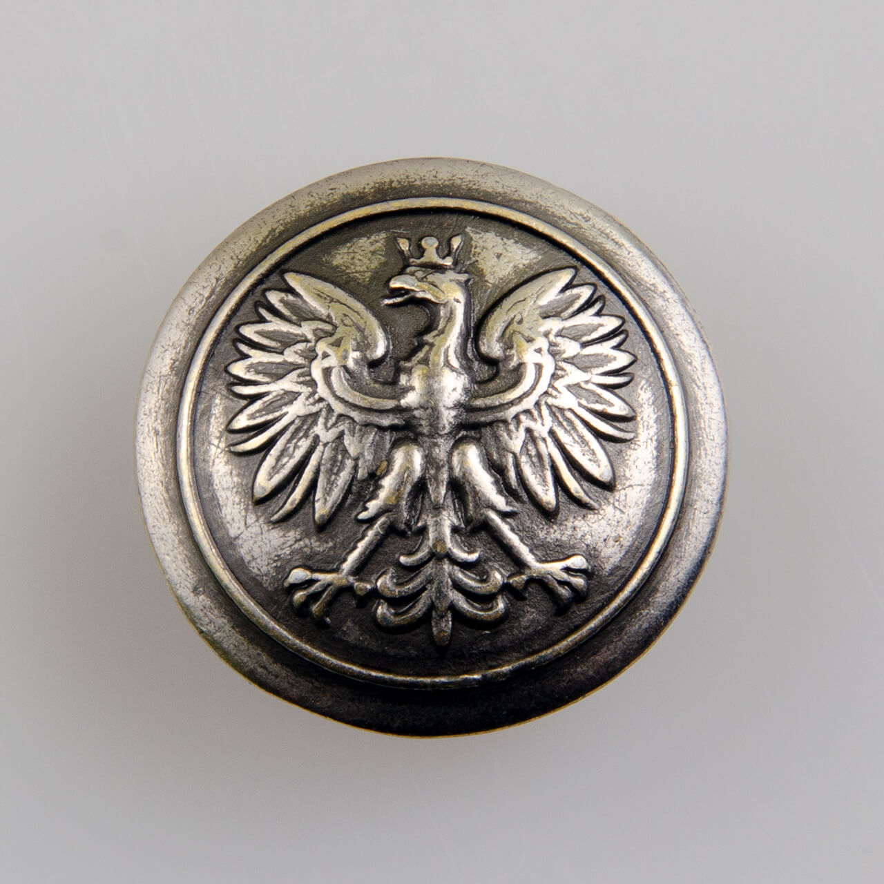 Policyjny guzik z orłem kolor srebrny przecierany, śr. 22mm (Oficjalny wzór)