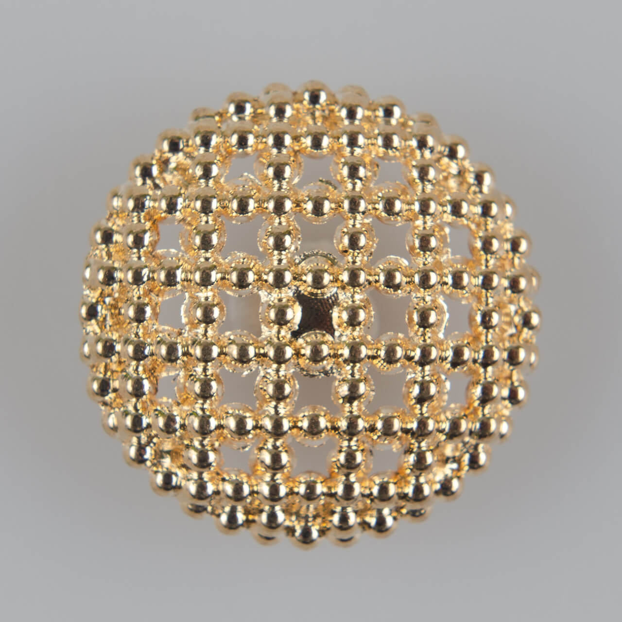 Guzik elegancki siateczkowy, pikowany, kolor złoty (różowe złoto), śr. 25 mm