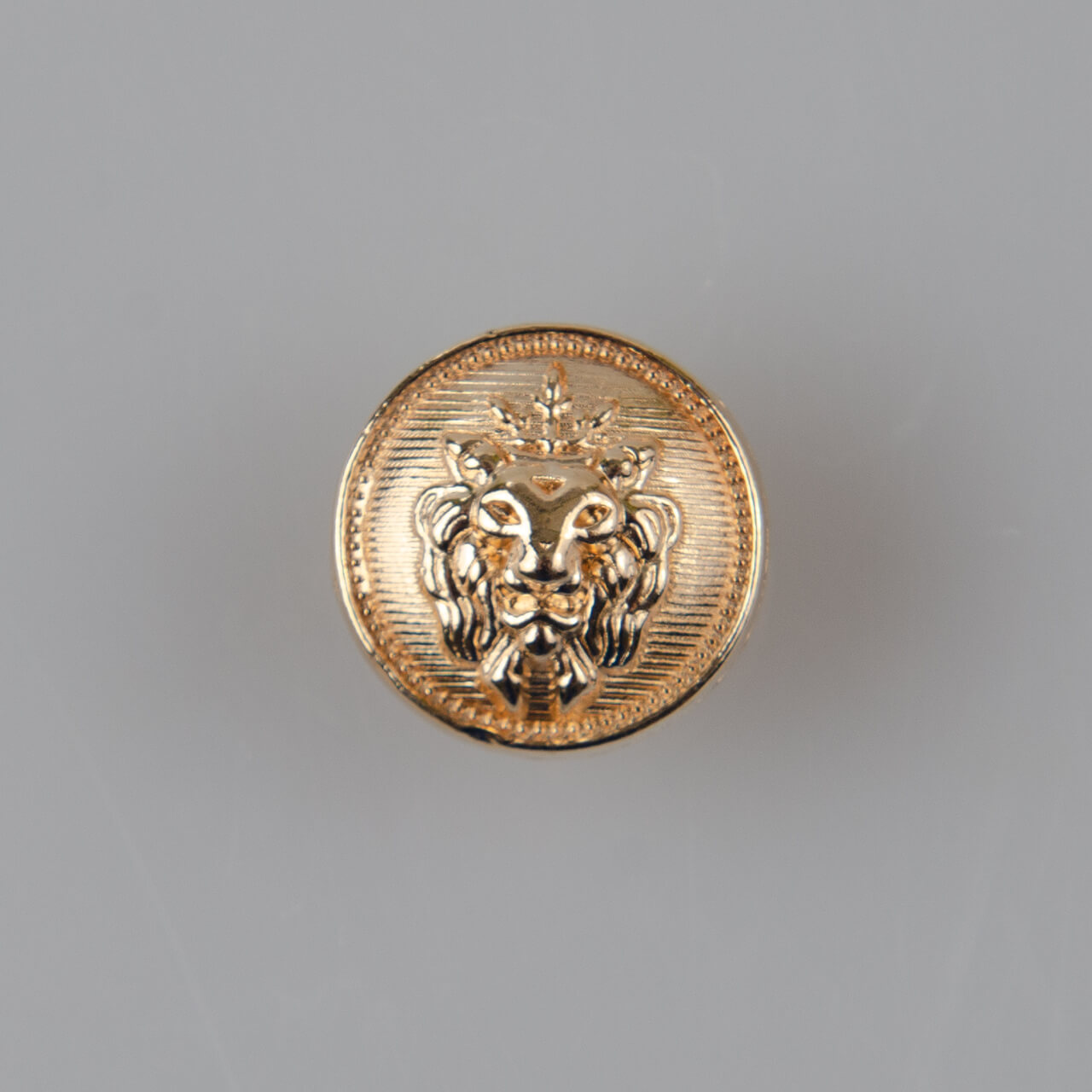 Guzik z głową lwa, kolor złoty (różowe złoto) śr. 15 mm