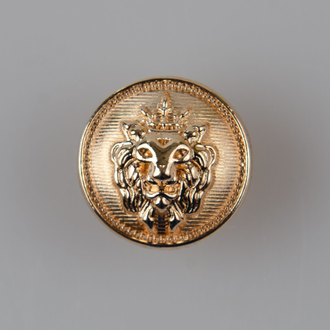 Guzik z głową lwa, kolor złoty (różowe złoto) śr. 17 mm