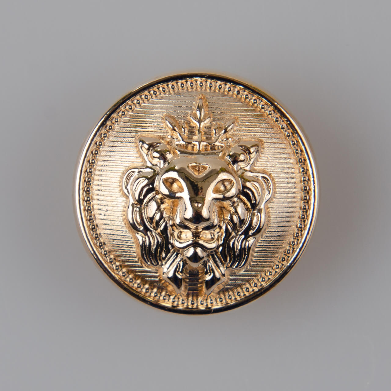 Guzik z głową lwa, kolor złoty (różowe złoto) śr. 23 mm