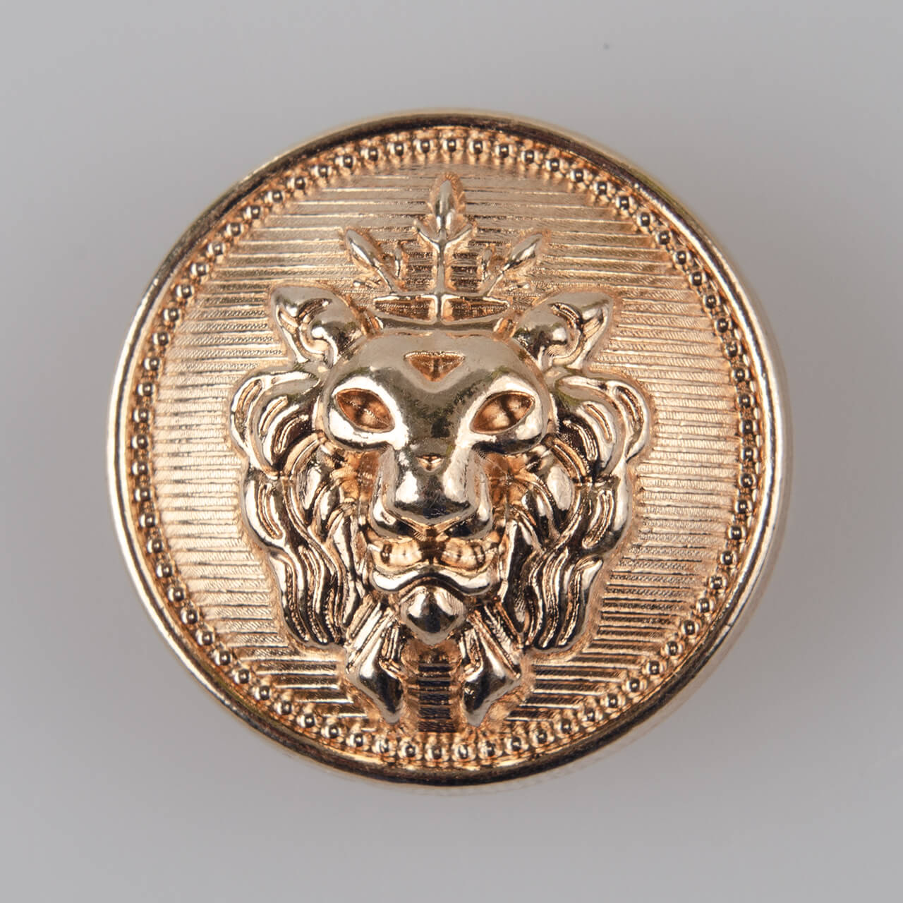 Guzik z głową lwa, kolor złoty (różowe złoto) śr. 25 mm