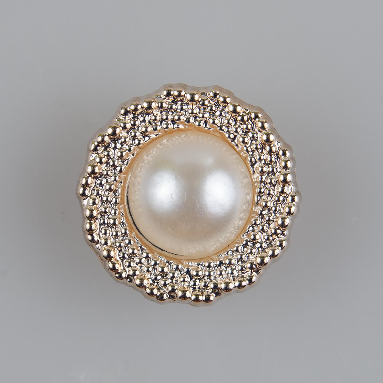 Guzik elegancki z perłą i szerokim rantem, tworzywo sztuczne, śr. 21 mm (34"), kolor jasnozłoty