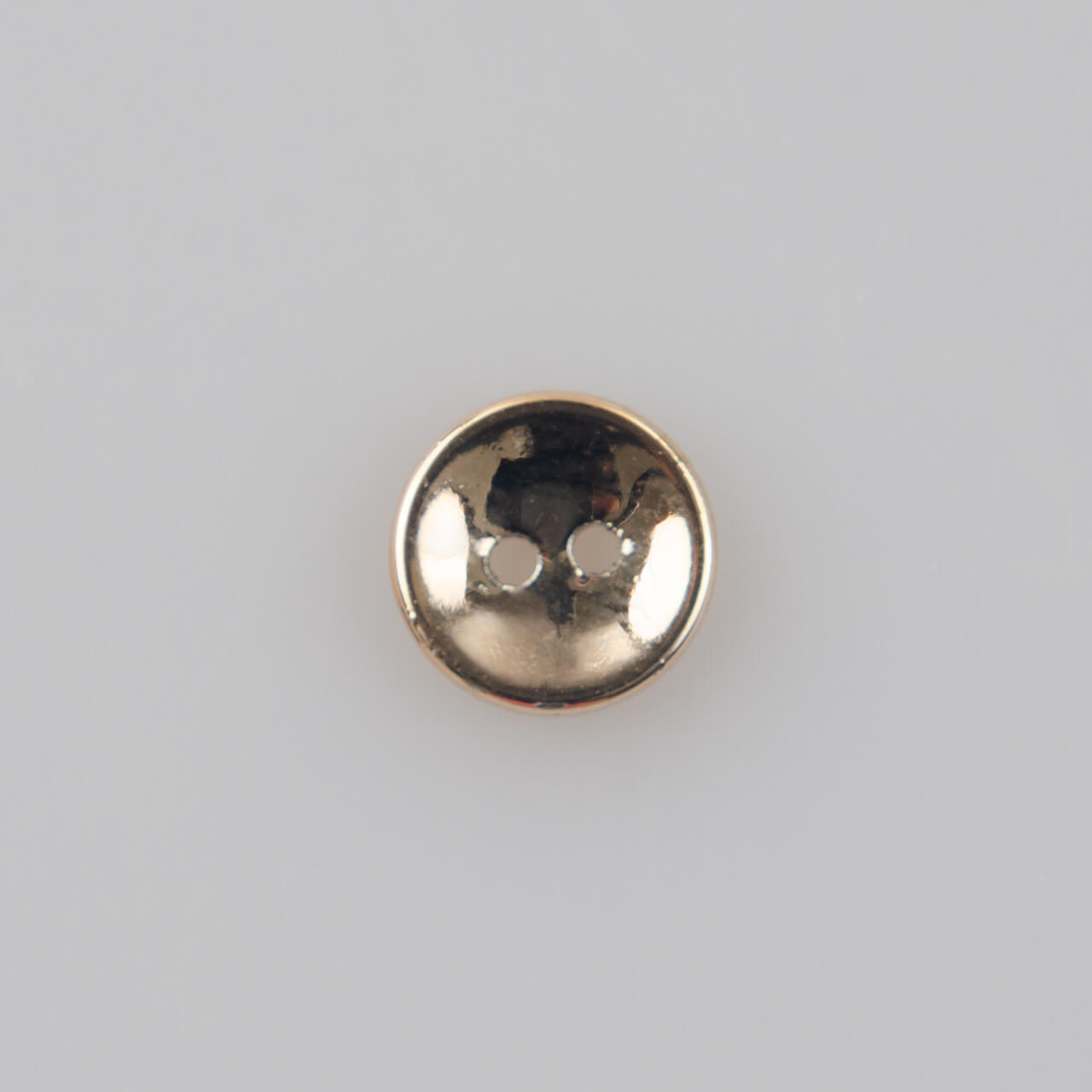 Guzik płaski klasyczny 2 dziurki, tworzywo sztuczne, śr. 9 mm (14"), złoty błyszczący